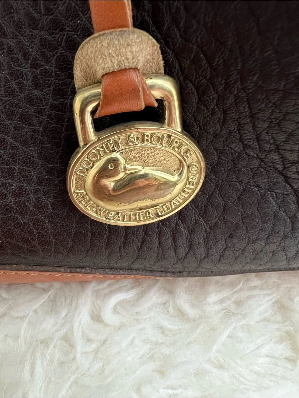 Dooney & Bourke VINTAGE black pebbled Leather satchel with British tan trim.